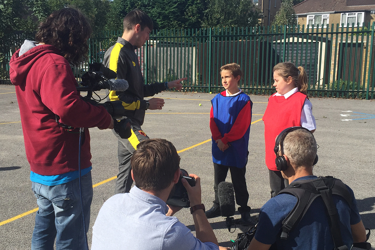 Pupils being filmed at Kingsway Junior School in Watford.
