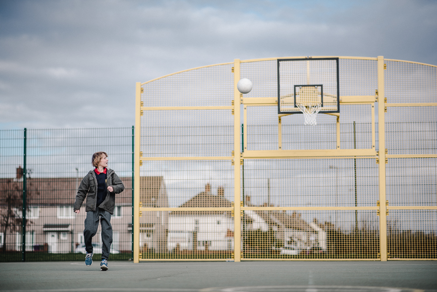 Young person on a basketball court