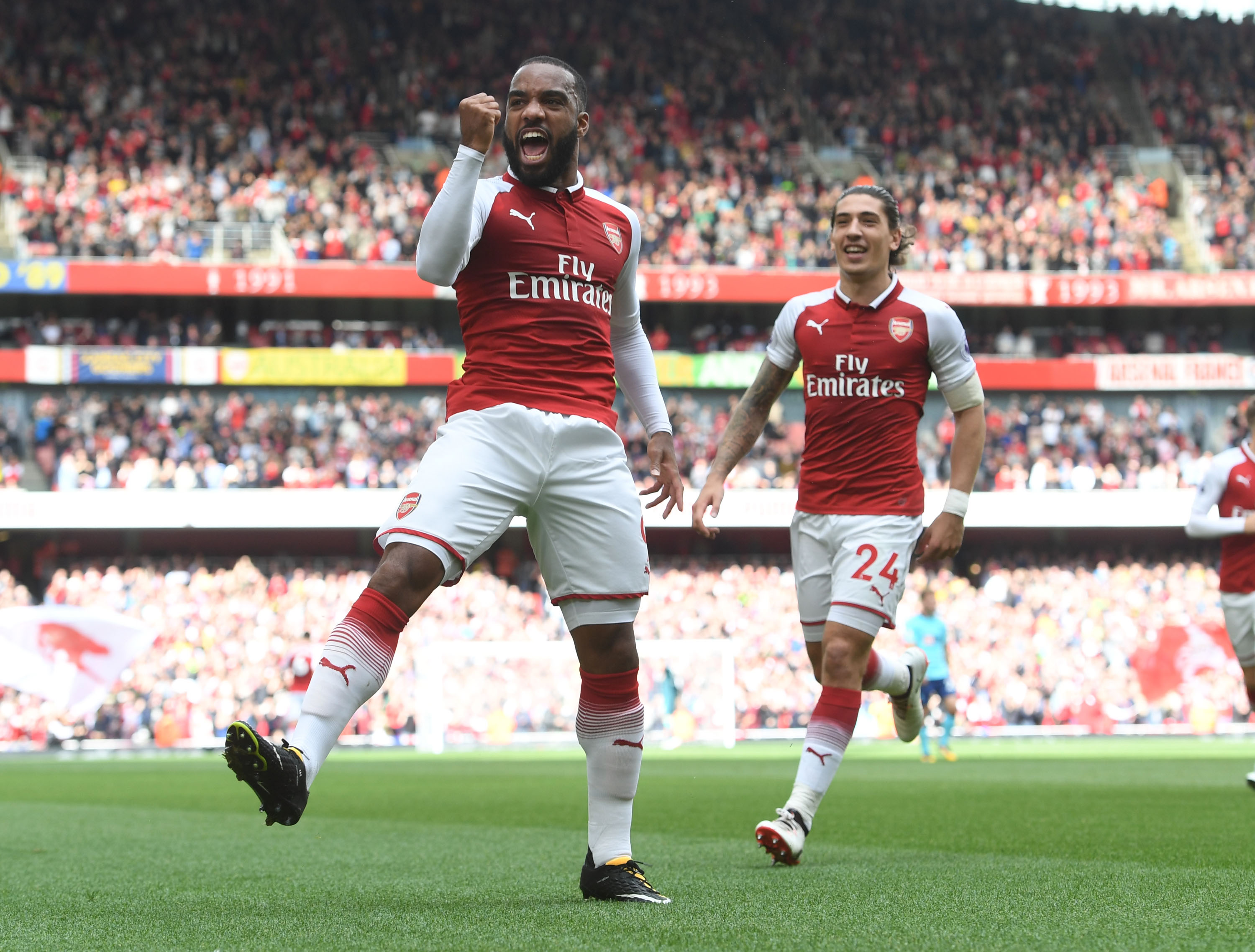 Arsenal striker Alexandre Lacazette celebrates after scoring a goal during a Premier League football match
